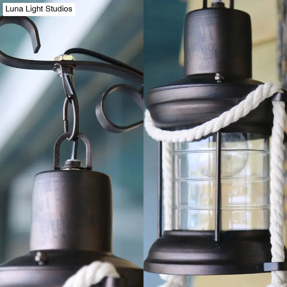 Coastal Black Kerosene Sconce with Clear Glass Bulb and Wooden Backplate for Outdoor Lighting